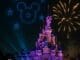 Disney Tales of Magic nighttime show at Disneyland Paris with drones forming Mickey and fireworks above Sleeping Beauty Castle.