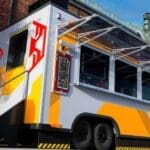 Marvel-themed street food in front of the food truck