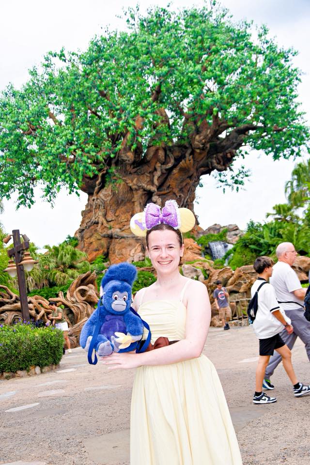 Jane Disneybound from Tarzan at Animal Kingdom Guest Disneybounding as Jane from Tarzan with a plush gorilla at Animal Kingdom