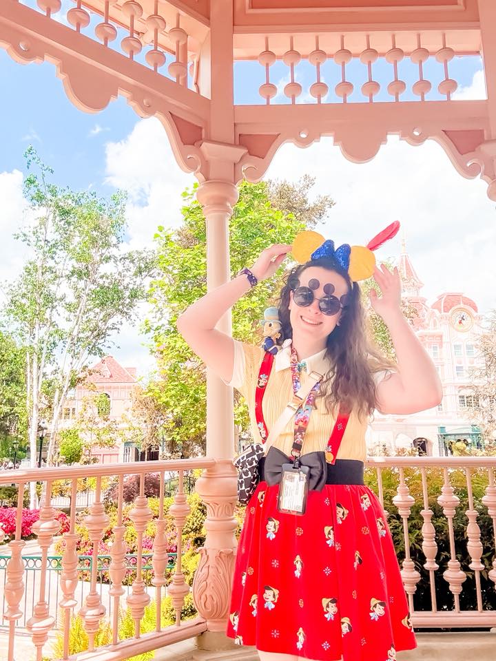 Pinocchio Disneybound at Disneyland Paris Guest Disneybounding as Pinocchio with a skirt featuring Pinocchio designs at Disneyland Paris