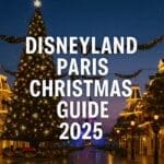 Giant Christmas tree and Sleeping Beauty Castle on Main Street, U.S.A. at Disneyland Paris, sparkling with festive lights and snow, with the text “Disneyland Paris Christmas Guide 2025” overlay
