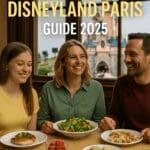 Family enjoying gluten-free meal at Disneyland Paris restaurant with Sleeping Beauty Castle in background and “Gluten-Free Disneyland Paris Guide 2025” text