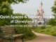 A tranquil garden bench along a leafy path at Disneyland Paris, with Sleeping Beauty Castle softly blurred in the background and overlaid text promoting quiet spaces and sensory breaks.