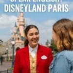 Friendly Disneyland Paris Cast Member speaking to guests in English