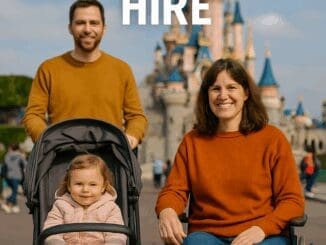 Family using stroller and wheelchair at Disneyland Paris with castle in background