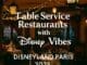 Themed restaurant interior at Disneyland Paris with fairy lights and Disney-style decor, promoting top table service dining options for 2025
