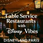 Themed restaurant interior at Disneyland Paris with fairy lights and Disney-style decor, promoting top table service dining options for 2025