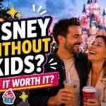 Adults enjoying Disneyland Paris together without kids in a lively theme park setting