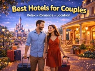 Couple arriving at a stylish theme park hotel with luggage in a relaxed romantic setting