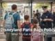 Family going through bag check at a theme park entrance for Disneyland Paris bags policy guide