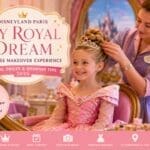 Child enjoying the My Royal Dream princess makeover experience inside Disneyland Hotel at Disneyland Paris with royal hairstyle, tiara and princess dress