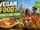 Vegan food at Disneyland Paris with plant-based meals and castle background